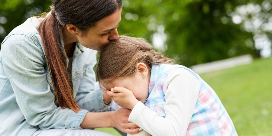 mom with child having a meltdown