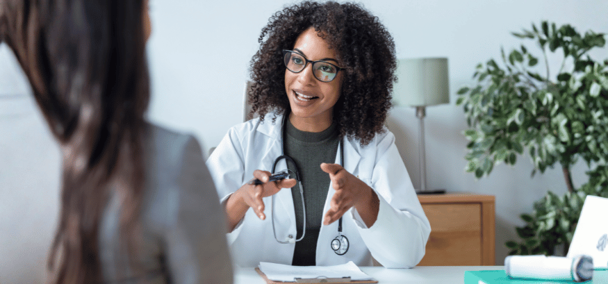 female doctor explaining medical condition to patient