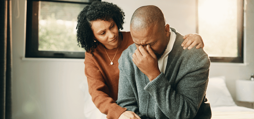 woman comforting a stressed man