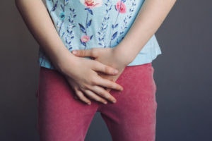 child struggles with incontinence and sickle cell anemia