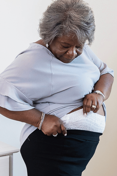 woman trying on diaper