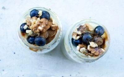 blueberries and overnight oats in two jars
