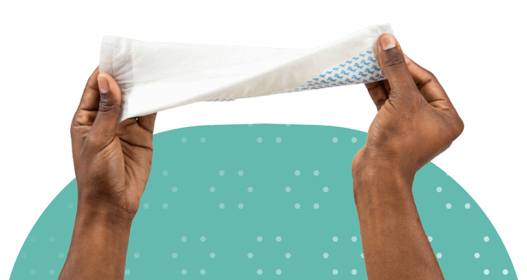hands twisting an incontinence booster pad