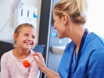 Child speaking with doctor about Hirschsprung's disease and incontinence