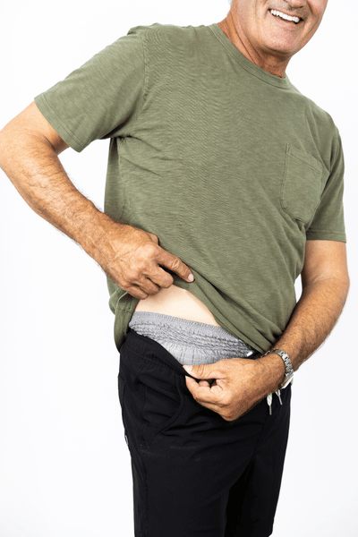 man trying on an adult diaper