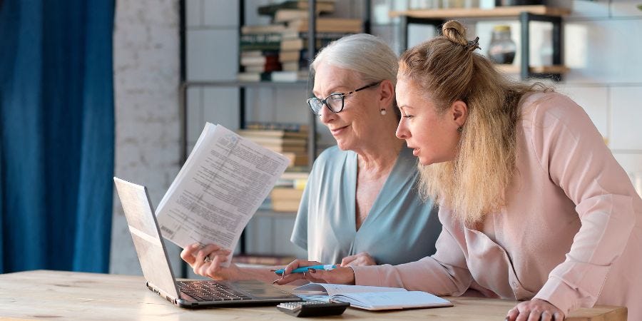 Women checking insurance coverage