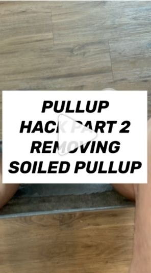 woman demonstrating a soiled pull-on