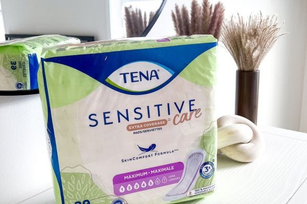 tena incontinence pads on table