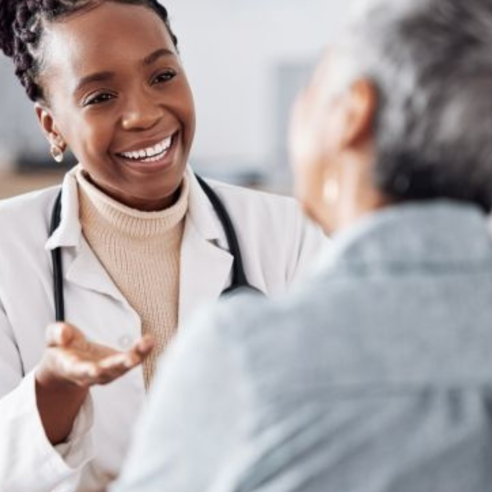 woman at doctor getting prescription